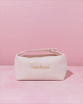 Load and play video in Gallery viewer, The Halo Glow Essential Bag